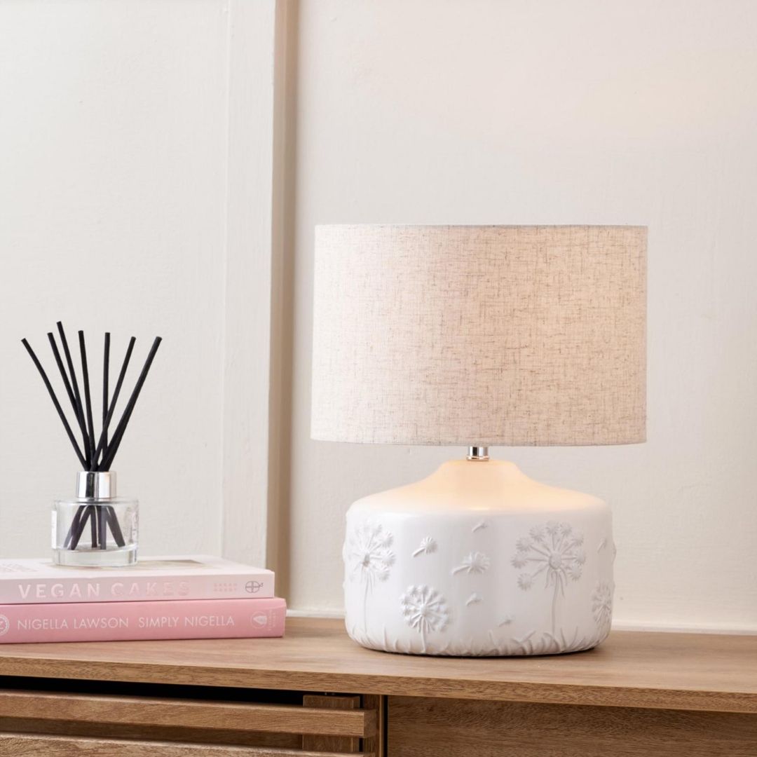Freyza - Floral Ceramic Table Lamp | Small White Moulded Base with Intricate Detailing | Charming Accent Light with Natural Cotton Drum Shade