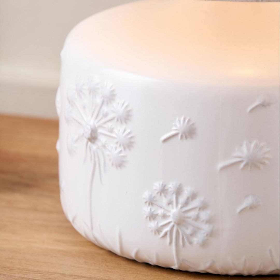 Freyza - Floral Ceramic Table Lamp | Small White Moulded Base with Intricate Detailing | Charming Accent Light with Natural Cotton Drum Shade