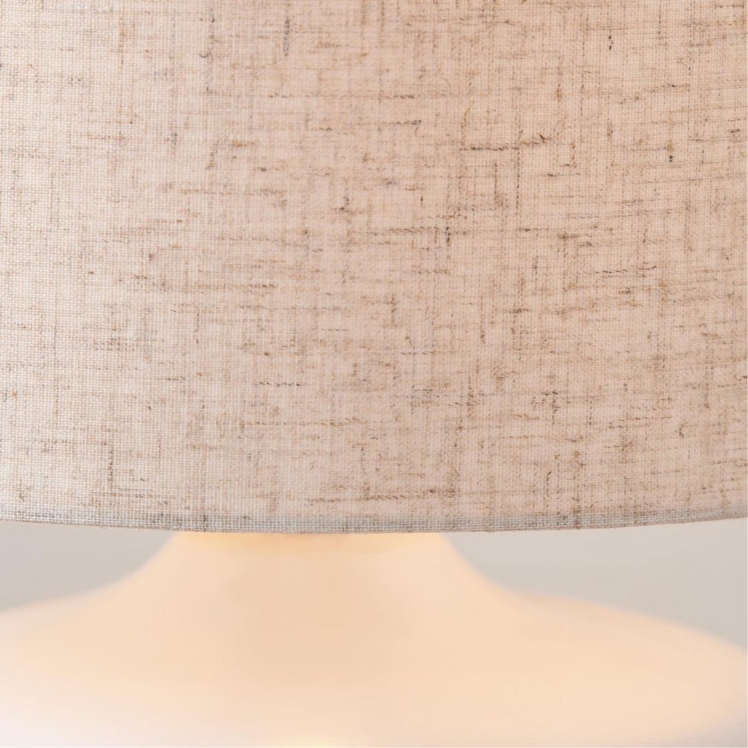 Freyza - Floral Ceramic Table Lamp | Small White Moulded Base with Intricate Detailing | Charming Accent Light with Natural Cotton Drum Shade