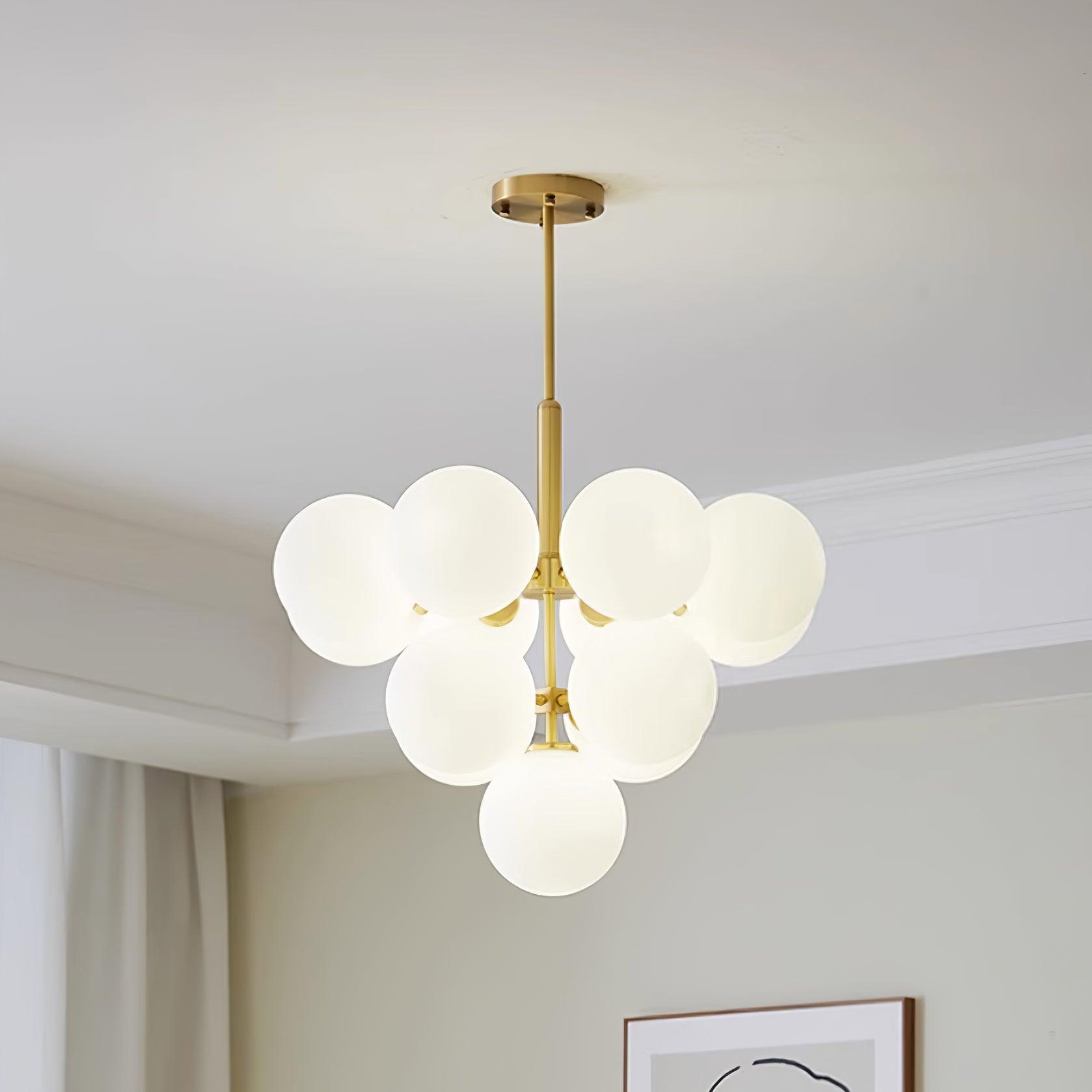 Freyza | Lustre en laiton avec globe en verre – Lustre moderne pour salle à manger et salon