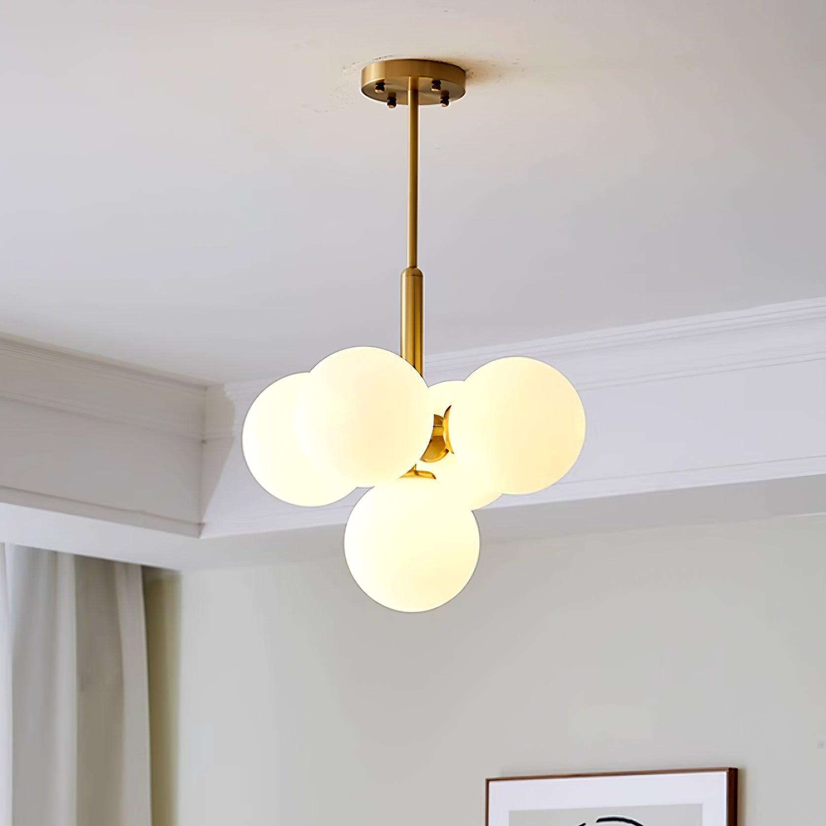 Freyza | Lustre en laiton avec globe en verre – Lustre moderne pour salle à manger et salon