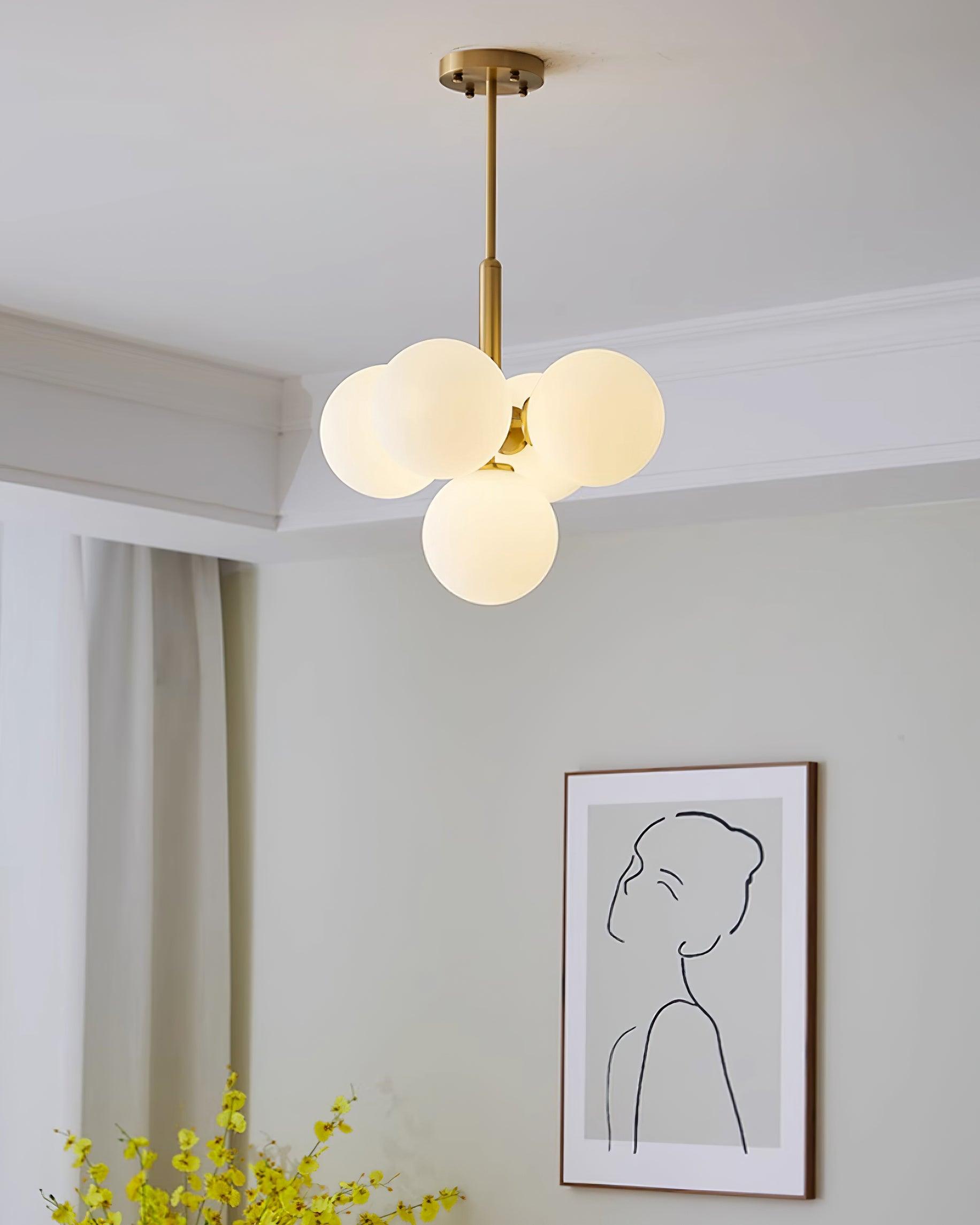 Freyza | Lustre en laiton avec globe en verre – Lustre moderne pour salle à manger et salon