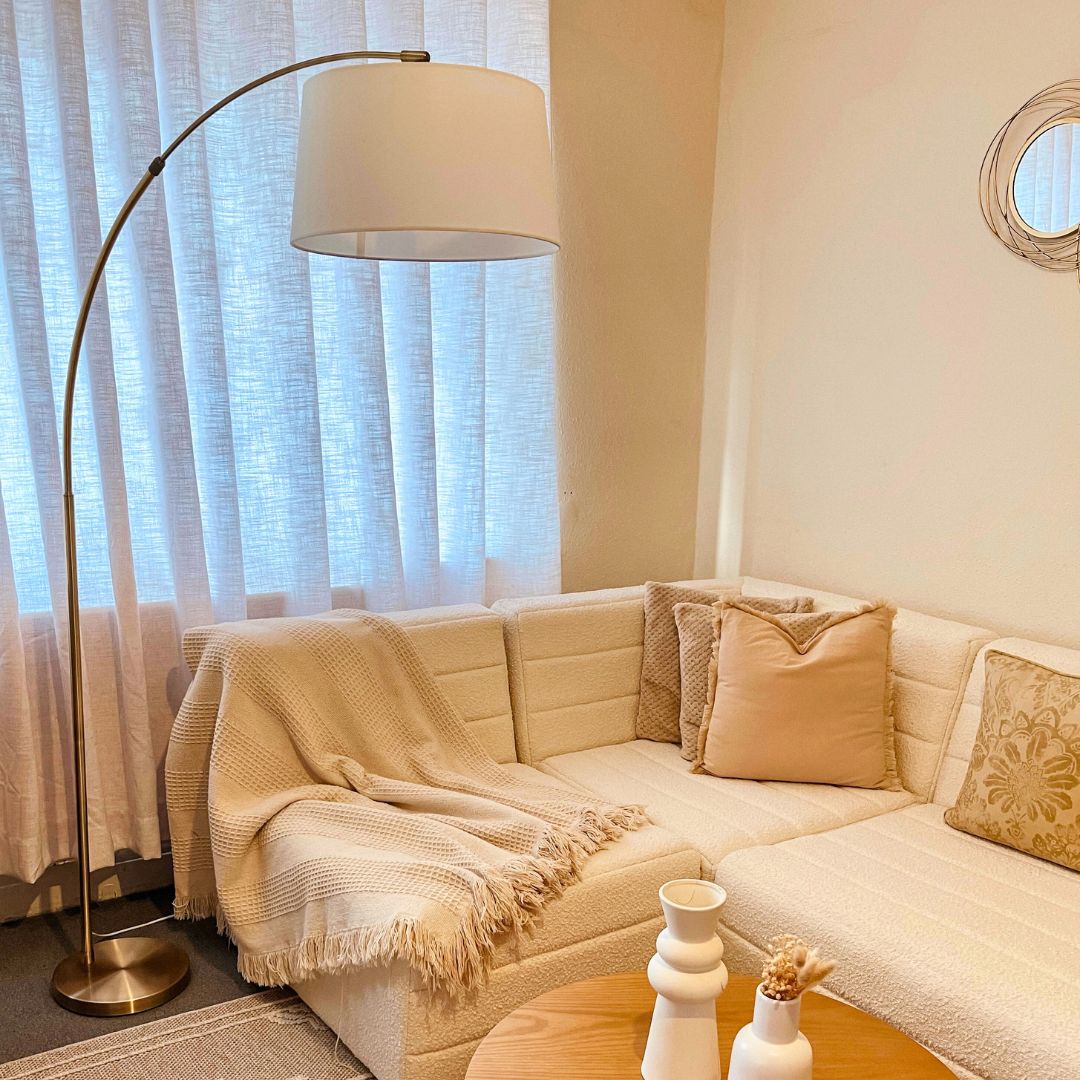 Freyza - Antique Brass Arc Floor Lamp | Contemporary 176cm Overhanging Standing Light | Elegant Curved Design with Fabric Shade